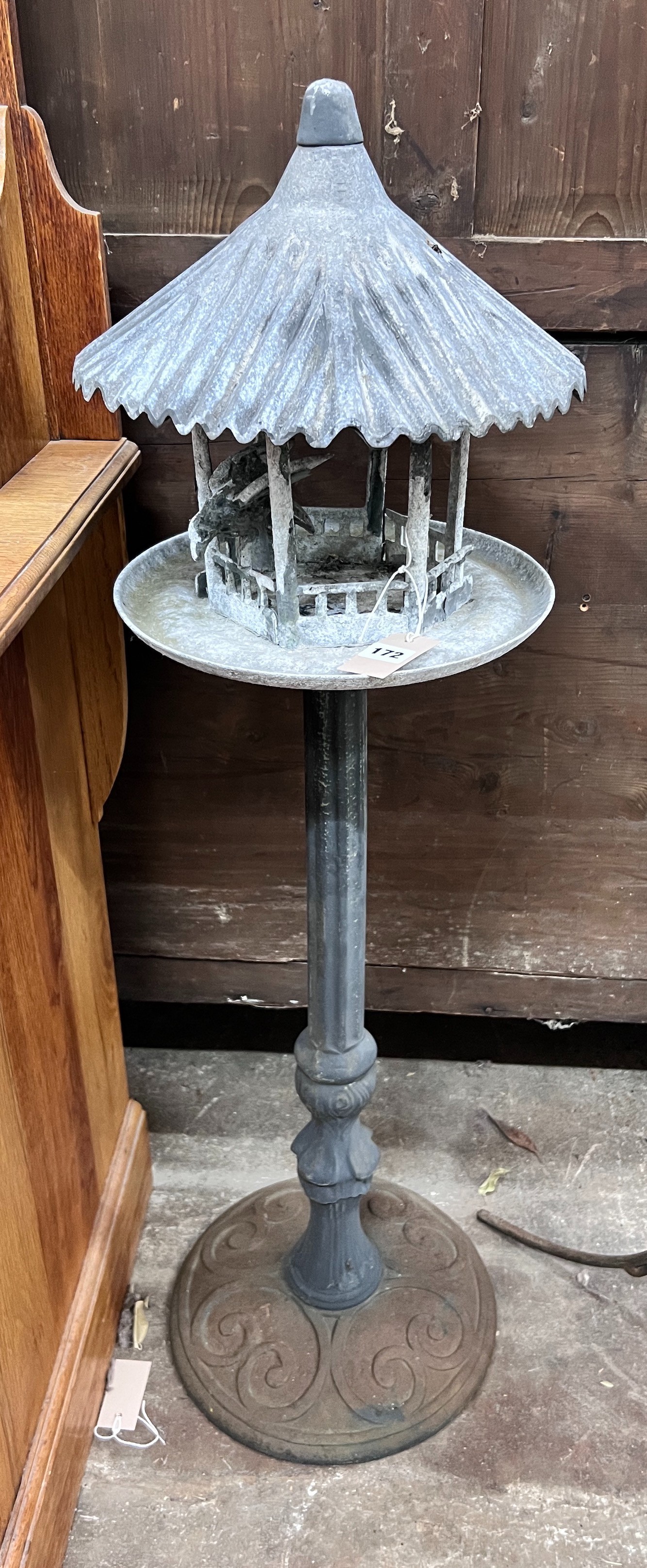 A cast iron and galvanised metal garden lantern / bird table, height 110cm *Please note the sale commences at 9am.